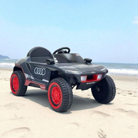 صورة سيارة أطفال كهربائية بتصميم أودي